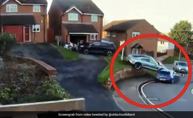 Porsche Drives Over Wall, Lands On Another Car In Viral Video