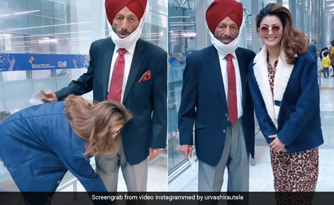 Urvashi Rautela ने एयरपोर्ट पर मिल्खा सिंह को देख छू लिये उनके पैर, फिर यूं साथ क्लिक कराई फोटो- Viral हुआ Video