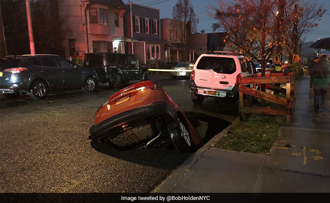 Massive Sinkhole Swallows SUV In New York City