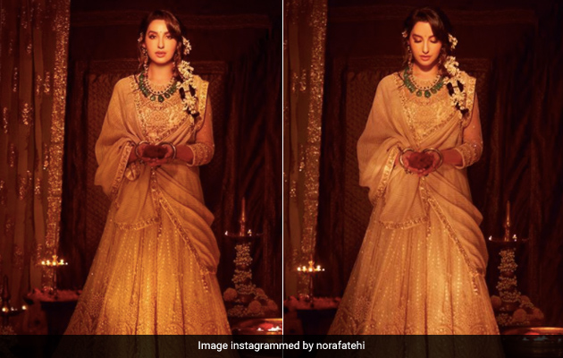 In A Radiant White Lehenga, Nora Fatehi Lights Up Festive Style