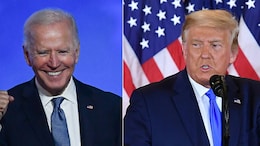 US Voters Prefer Biden's Democracy Approach, Trump's Economy Plan: Report