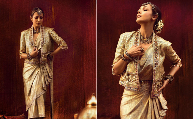 Malaika Arora Sparkles In An Ethnic Fusion Look With A Gold Jacket And Chunky Jewellery