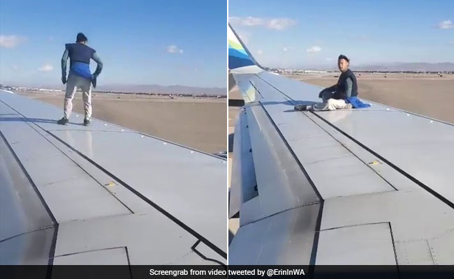 Man Climbs Airplane Wing Right Before Takeoff In Bizarre Video