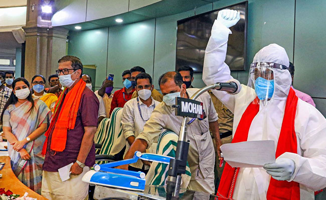 Covid Positive LDF Councillor Sworn In Wearing PPE Kit In Kerala