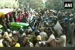 Watch: Farmers Run Tractor Over Barricade In Clash With Uttarakhand Cops Watch: Farmers Run Tractor Over Barricade In Clash With Uttarakhand Cops