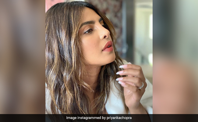 Priyanka Chopra's Cherry Pout And Beach Waves Are Perfect For This Time Of Year