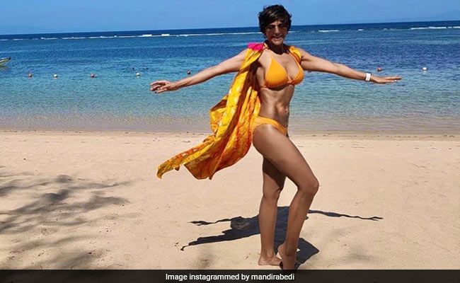 Mandira Bedi Sets Our Screens On Fire In A Yellow Bikini Set