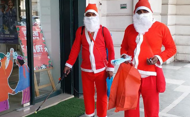 Santa Claus Gifts Masks, Sanitises Delhi Market For Christmas