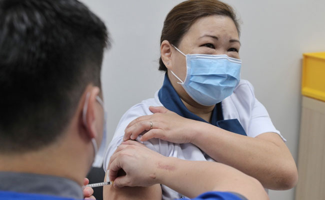 Singapore Begins COVID-19 Vaccinations With Pfizer In One Of Asia's First