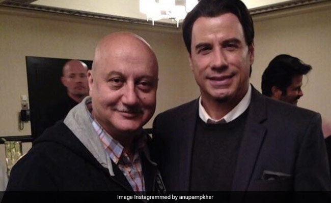 Just A Pic Of John Travolta With Anupam Kher. Can You Spot Anil Kapoor In The Background?