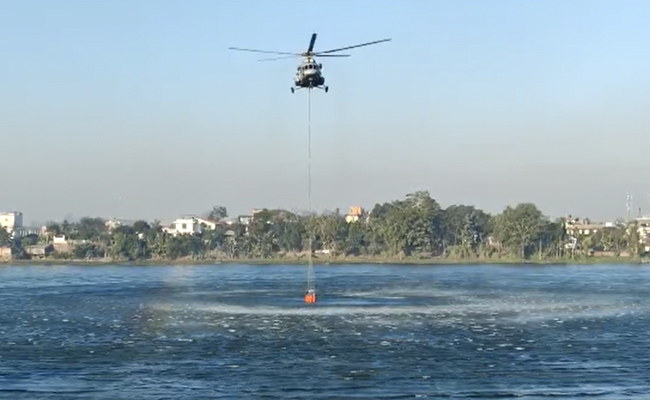 On Camera, Air Force Chopper Lifts Water To Fight Wildfire In Manipur