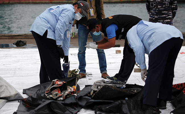 Indonesia Plane Likely Broke Apart When Hitting Waters, Says Investigator