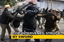 Delhi Cop Injured By Sword During Clashes At Farmers' Protest Site Delhi Cop Injured By Sword During Clashes At Farmers' Protest Site