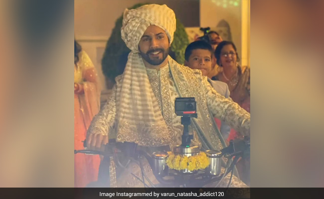 Viral: Varun Dhawan's <I>Filmy</i> Entry On A Quad Bike At His Wedding. Pics Here