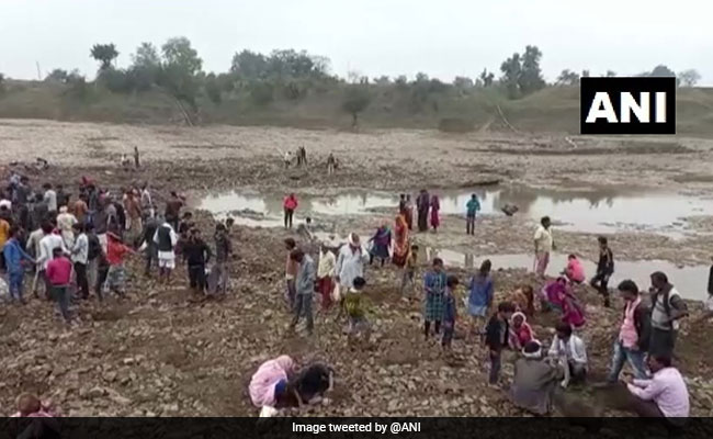 People Gather To Dig Madhya Pradesh Riverbed In Hope Of Finding Old Coins