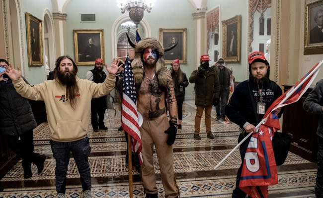Trump Supporter Seen In Horned Fur Hat Charged In US Capitol Violence