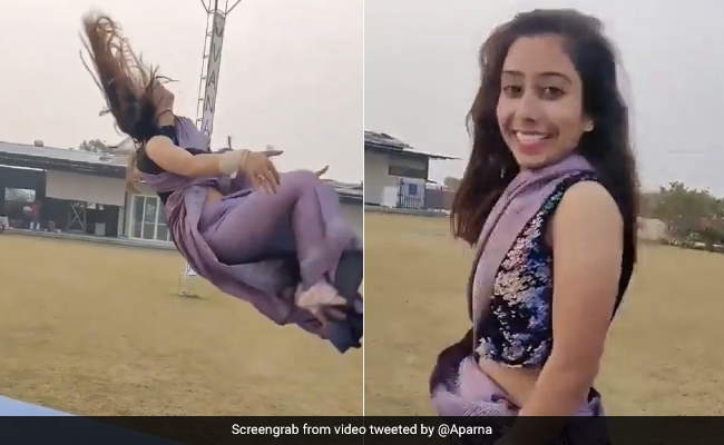 लड़की ने साड़ी पहनकर लगाई गजब की गुलाटी, Stunt देख लोगों के उड़े होश - देखें Video