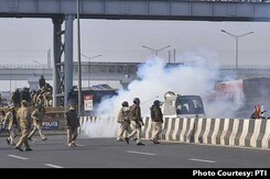 Tear Gas, Lathi-Charge At Farmers' Tractor Rally Amid R-Day Celebrations Tear Gas, Lathi-Charge At Farmers' Tractor Rally Amid R-Day Celebrations