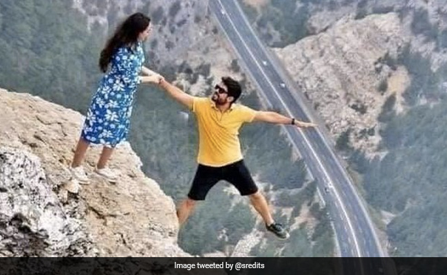 Couple Poses On Cliff's Edge In Viral Pic That Has People Baffled