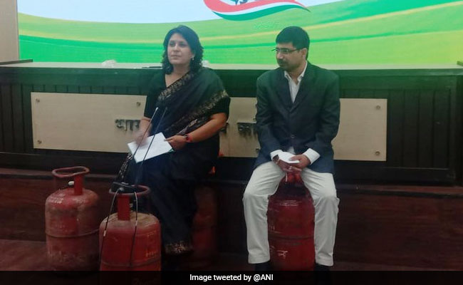 Congress Slams Centre Over LPG Price Hike, Holds Press Meet Sitting On Cylinder