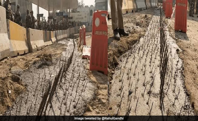 Protesting Farmers Plant Flowers In Response To Iron Nails