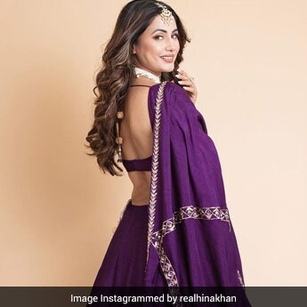 hina khan purple dress Hina Khan looks stunning in a purple lehenga. A desi girl at heart, we loved the way Hina can carry off any outfit with panache! . #HinaKhan @realhinakhan