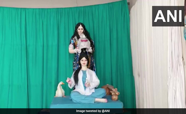 Goddess Saraswati Crowns A Health Worker At A Bengal Pandal. See Pic