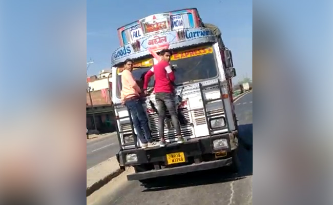 Watch: Madhya Pradesh Man Keeps Speeding As 2 Hold On To Truck Front
