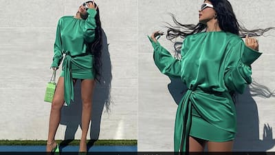silk kylie jenner green dress Kylie Jenner Dark Green Off Shoulder Slit Dress Christmas Eve 2019