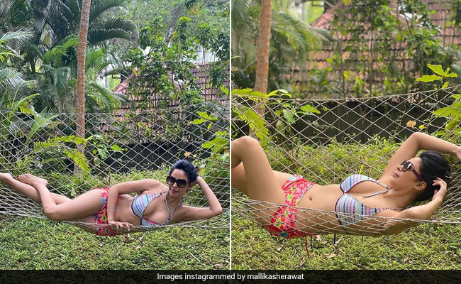 Mallika Sherawat In A Printed Bikini Takes Us Back To Palm Trees And Wild Nature