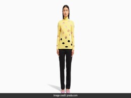 Prada's Yellow Sweater With Holes Reminds Twitter Of Swiss Cheese Prada's Yellow Sweater With Holes Reminds Twitter Of Swiss Cheese