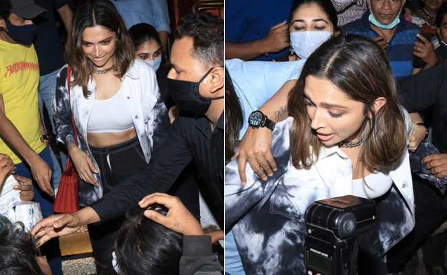 Mobbed, Deepika Padukone Struggles To Secure Her Bag, Then Walks Away With A Smile