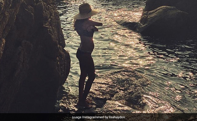 Lisa Haydon Sports Her Baby Bump In A Stylish Black Bikini