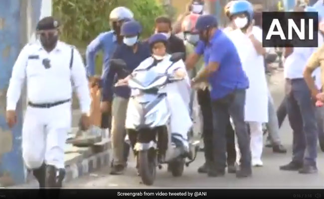 Mamata Banerjee Nearly Falls While Driving Electric Scooter In Bengal