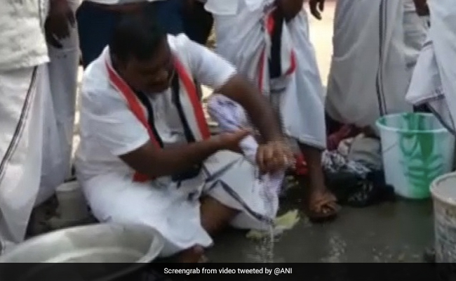Watch: AIADMK Candidate Washes Clothes, Promises Voters Washing Machines