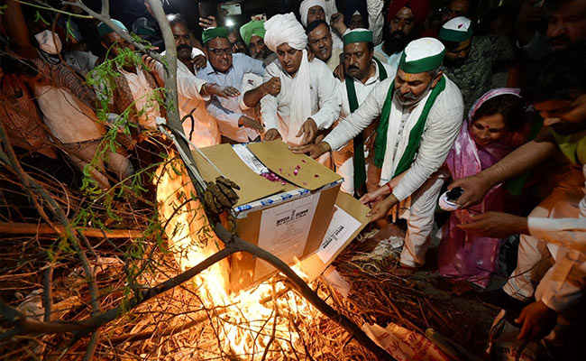 Farmers Burn Copies Of Farm Laws To Mark 'Holika Dahan' Day Before Holi