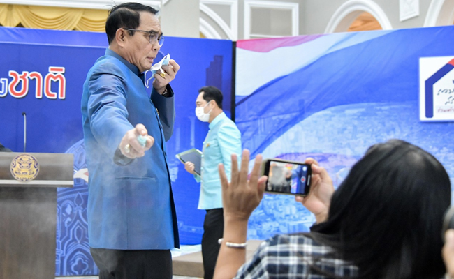 Watch: This PM Sprays Reporters With Hand Sanitiser To Duck Tricky Questions