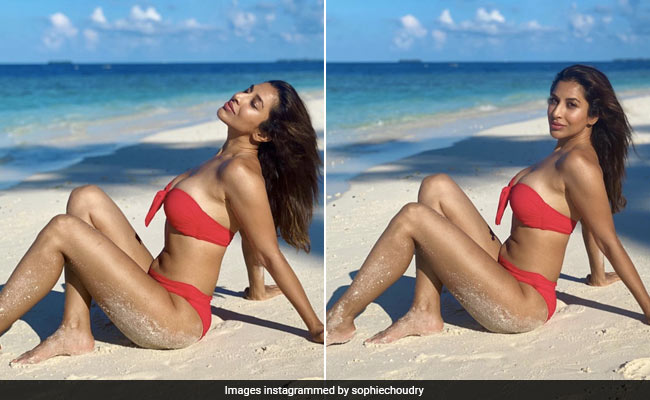 In A Bright Red Bikini, Sophie Choudry Raises The Bar For Beach Style
