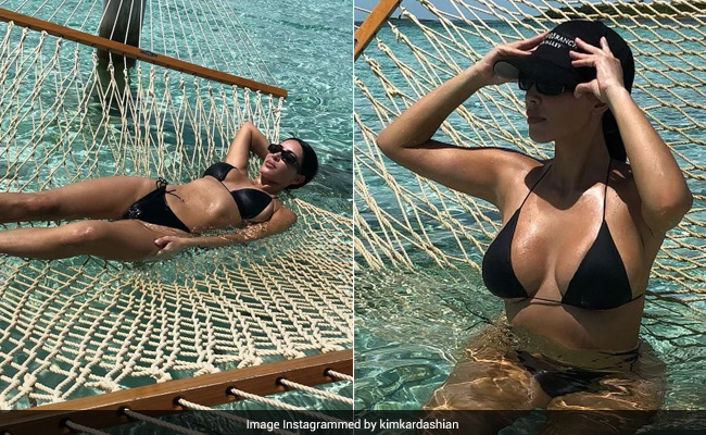 Kim Kardashian Makes Her Beach Holiday Look Sensational In A Black Bikini