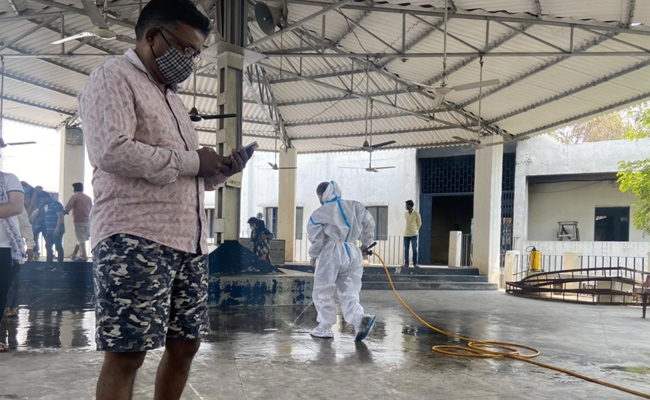 "A Mask, A Prayer": Lucknow Crematorium Workers Face Rush Of Covid Bodies