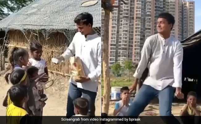 युवक ने छोटे बच्चों को बांटे बर्गर और किया 'बारिश की जाए' सॉन्ग पर डांस, B Praak ने शेयर किया Video