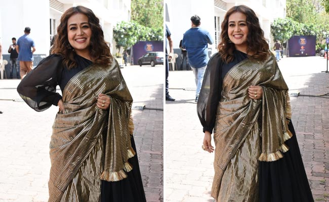Neha Kakkar Looks Fabulous As Ever In A Black And Gold <i>Saree</i>