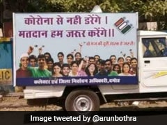 चुनाव प्रचार के लिए बोर्ड पर लिखा था, 'कोरोना से नहीं डरेंगे, मतदान हम जरूर करेंगे', तो IPS ने दिया ऐसा रिएक्शन