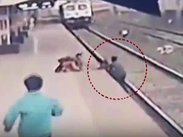 On Camera, Child's Rescue As He Loses Balance Near Train Tracks