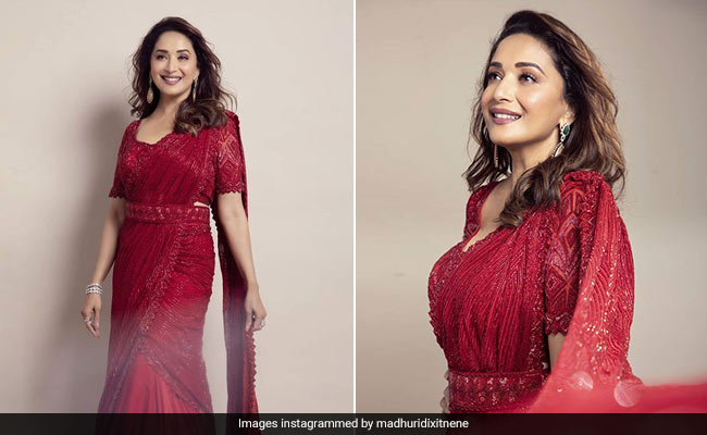 We Cherry-Ish Madhuri Dixit's Timeless Grace And Style In Her Ravishing Red <i>Saree</i>