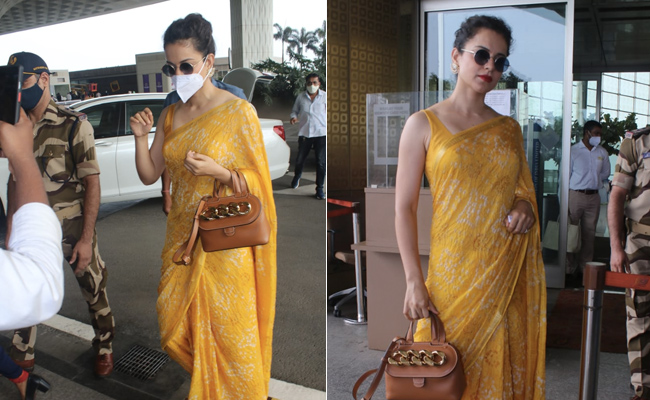 Kangana Ranaut Gives A Summer Spin To Airport Fashion In A Bright Yellow <i>Saree</i>