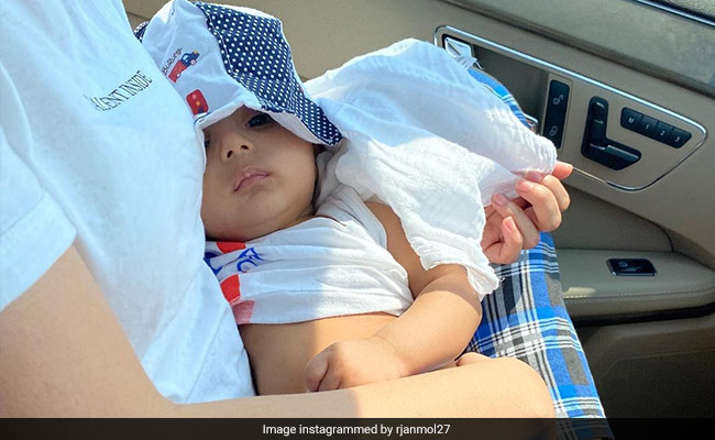 Just A Pic Of Amrita Rao And RJ Anmol's Baby Son Veer "Keeping A Close Check" On His Dad's Driving