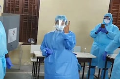 DMK's Kanimozhi, Covid Positive, Votes In PPE Suit In Chennai DMK's Kanimozhi, Covid Positive, Votes In PPE Suit In Chennai