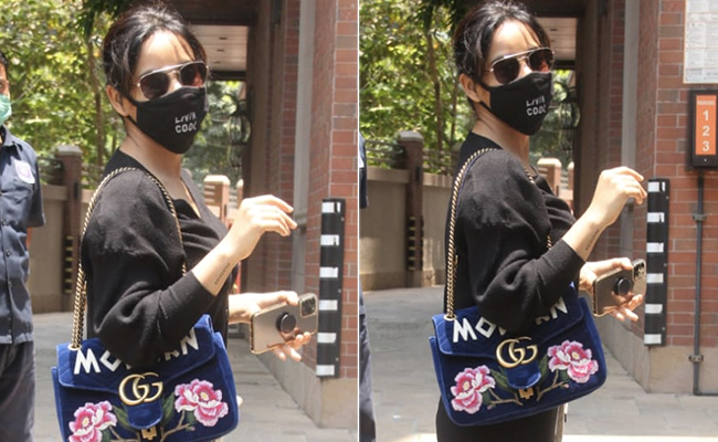 Neha Sharma's Sporty Tracksuit Gets A Chic Touch With A Rs 1.9 Lakh Gucci Handbag