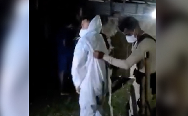 Assam Police Officer Wears PPE Kit To Shift Covid-19 Patient To Hospital